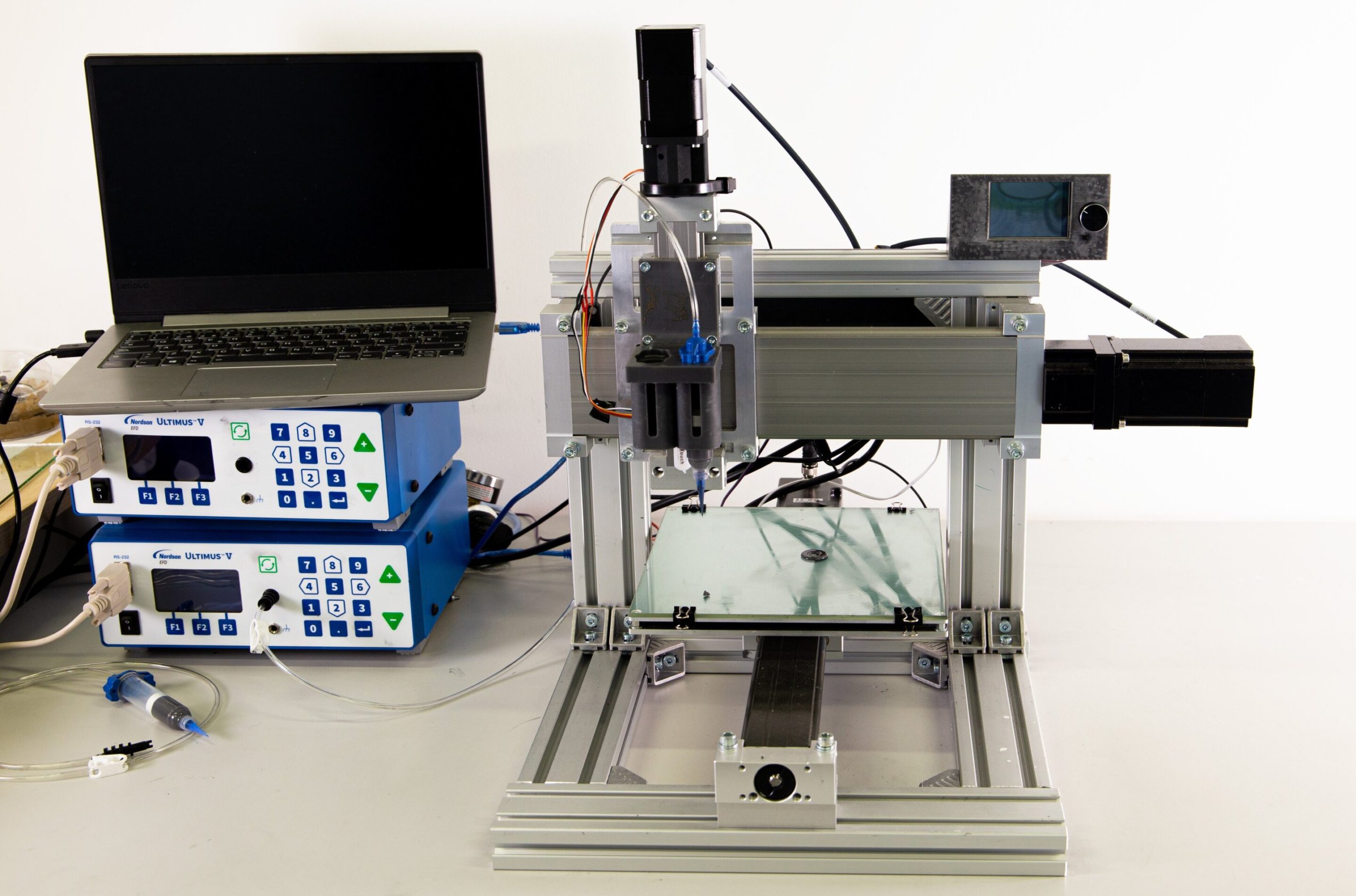 A 4D printer for smart materials with magneto- and electro-mechanical properties